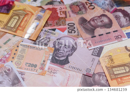 Money background, currency exchange, paper banknotes from different countries. Money cash currency 134681239