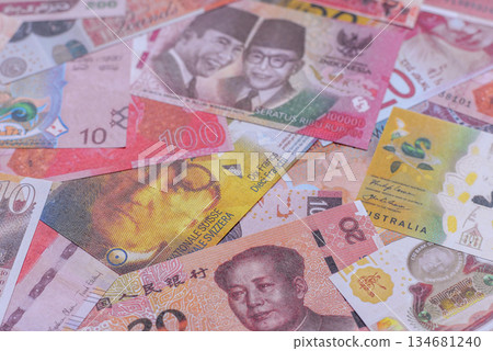 Money background, currency exchange, paper banknotes from different countries. Money cash currency 134681240