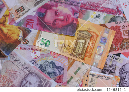 Money background, currency exchange, paper banknotes from different countries. Money cash currency 134681241