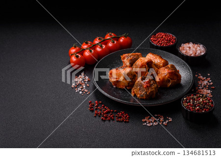 Hake fish cooked in pieces in tomato sauce, stew with peppers and carrots. Hake fish in tomato Hake fish cooked in pieces in tomato sauce, stew with peppers and carrots. Hake fish in tomato 134681513