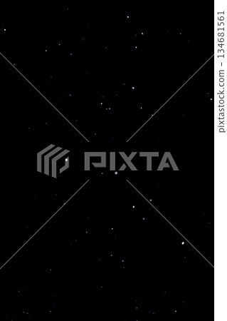 Light snow overlay on black background with sparse falling flakes 134681561