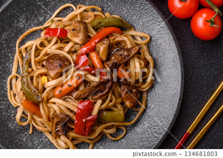 Asian food, noodles with vegetables, vegetarian dish with spicy sauce. Noodles with vegetables 134681803