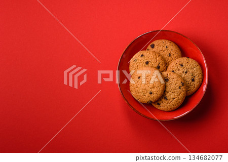 Food, oatmeal chocolate raisin cookies, dessert or breakfast pastry. Oatmeal chocolate cookies Food, oatmeal chocolate raisin cookies, dessert or breakfast pastry. Oatmeal chocolate cookies 134682077