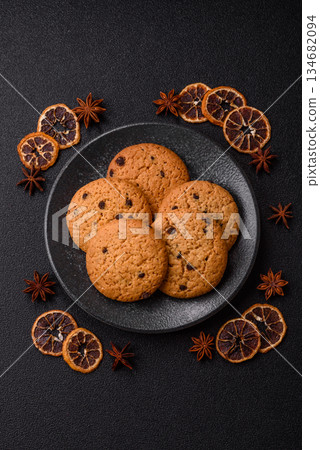 Food, oatmeal chocolate raisin cookies, dessert or breakfast pastry. Oatmeal chocolate cookies Food, oatmeal chocolate raisin cookies, dessert or breakfast pastry. Oatmeal chocolate cookies 134682094