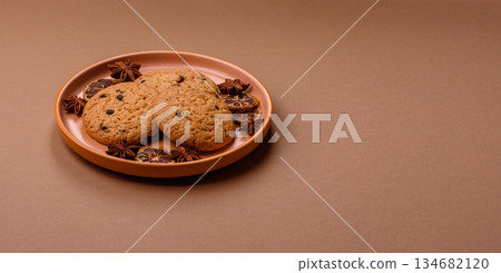 Food, oatmeal chocolate raisin cookies, dessert or breakfast pastry. Oatmeal chocolate cookies Food, oatmeal chocolate raisin cookies, dessert or breakfast pastry. Oatmeal chocolate cookies 134682120