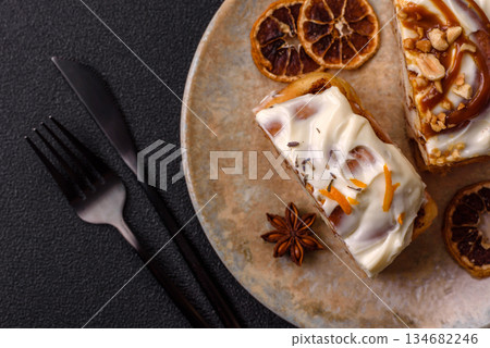 Cinnabon, a sweet cinnamon pastry, a high calorie bun or roll. Cinnabon with cinnamon Cinnabon, a sweet cinnamon pastry, a high calorie bun or roll. Cinnabon with cinnamon 134682246