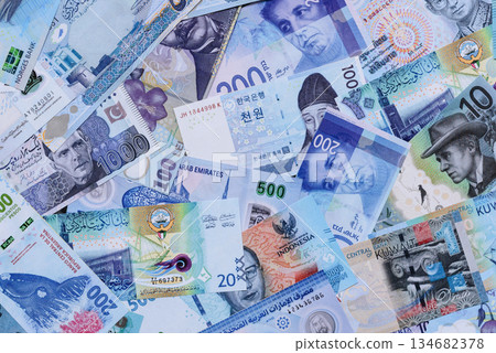 Money background, currency, paper banknotes from different countries. Money cash currency, blue Money background, currency, paper banknotes from different countries. Money cash currency, blue 134682378