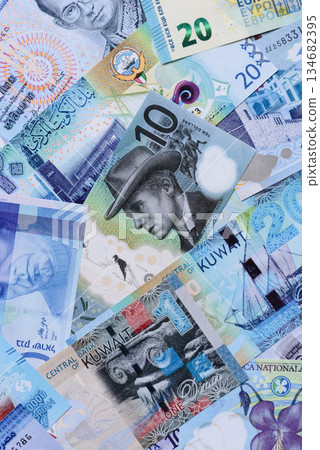Money background, currency, paper banknotes from different countries. Money cash currency, blue Money background, currency, paper banknotes from different countries. Money cash currency, blue 134682395