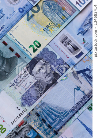 Money background, currency, paper banknotes from different countries. Money cash currency, blue Money background, currency, paper banknotes from different countries. Money cash currency, blue 134682414