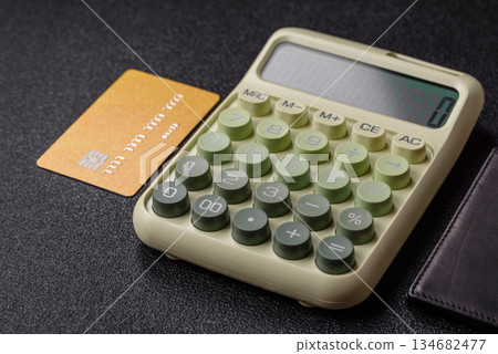 Calculator, money and expense calculations, tax form completion. Calculator, expense calculations 134682477