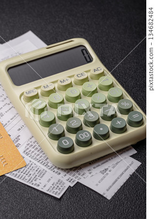 Calculator, money and expense calculations, tax form completion. Calculator, expense calculations 134682484