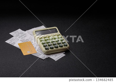 Calculator, money and expense calculations, tax form completion. Calculator, expense calculations 134682485