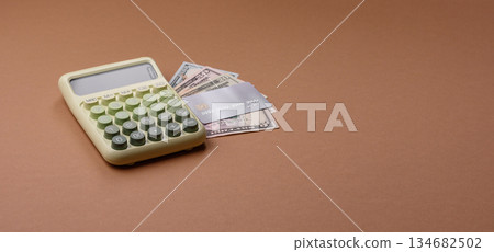 Calculator, money and expense calculations, tax form completion. Calculator, expense calculations Calculator, money and expense calculations, tax form completion. Calculator, expense calculations 134682502