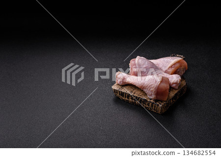 Raw chicken legs, poultry meat for grilling or barbecue. Chicken legs Raw chicken legs, poultry meat for grilling or barbecue. Chicken legs 134682554