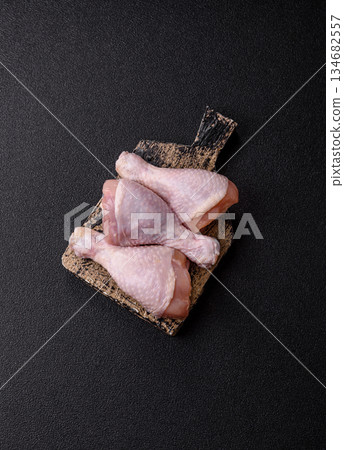 Raw chicken legs, poultry meat for grilling or barbecue. Chicken legs Raw chicken legs, poultry meat for grilling or barbecue. Chicken legs 134682557