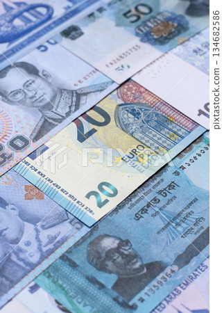 Money background, currency, paper banknotes from different countries. Money cash currency, blue Money background, currency, paper banknotes from different countries. Money cash currency, blue 134682586