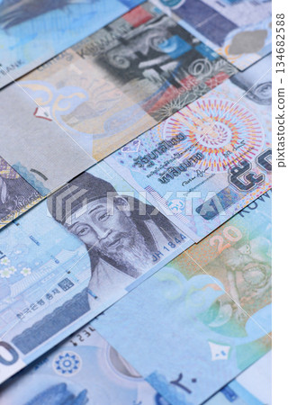 Money background, currency, paper banknotes from different countries. Money cash currency, blue Money background, currency, paper banknotes from different countries. Money cash currency, blue 134682588