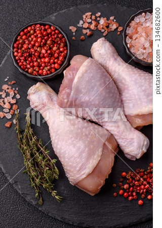 Raw chicken legs, poultry meat for grilling or barbecue. Chicken legs Raw chicken legs, poultry meat for grilling or barbecue. Chicken legs 134682600