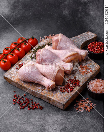 Raw chicken legs, poultry meat for grilling or barbecue. Chicken legs Raw chicken legs, poultry meat for grilling or barbecue. Chicken legs 134682614