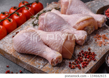 Raw chicken legs, poultry meat for grilling or barbecue. Chicken legs Raw chicken legs, poultry meat for grilling or barbecue. Chicken legs 134682615