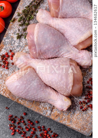Raw chicken legs, poultry meat for grilling or barbecue. Chicken legs 134682617