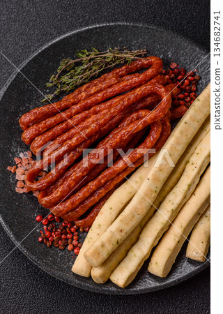 Grissini breadsticks, an Italian wheat pastry, are a great lunch snack. Grissini breadsticks 134682741