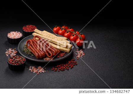 Grissini breadsticks, an Italian wheat pastry, are a great lunch snack. Grissini breadsticks Grissini breadsticks, an Italian wheat pastry, are a great lunch snack. Grissini breadsticks 134682747