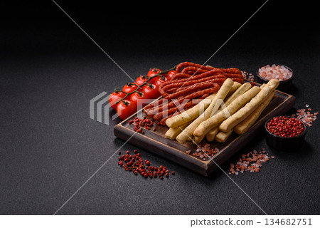 Grissini breadsticks, an Italian wheat pastry, are a great lunch snack. Grissini breadsticks Grissini breadsticks, an Italian wheat pastry, are a great lunch snack. Grissini breadsticks 134682751