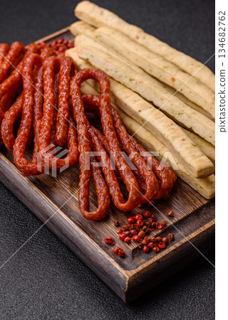 Grissini breadsticks, an Italian wheat pastry, are a great lunch snack. Grissini breadsticks Grissini breadsticks, an Italian wheat pastry, are a great lunch snack. Grissini breadsticks 134682762