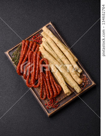 Grissini breadsticks, an Italian wheat pastry, are a great lunch snack. Grissini breadsticks 134682764
