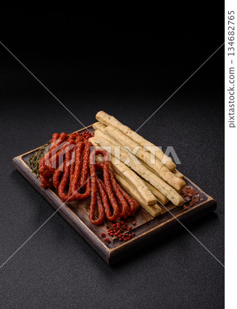 Grissini breadsticks, an Italian wheat pastry, are a great lunch snack. Grissini breadsticks 134682765