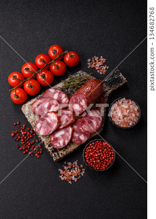 Smoked salami, thin beef or pork sausage, meat snacks. Salami sausage 134682768