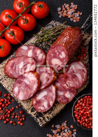 Smoked salami, thin beef or pork sausage, meat snacks. Salami sausage 134682772