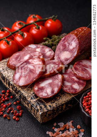 Smoked salami, thin beef or pork sausage, meat snacks. Salami sausage Smoked salami, thin beef or pork sausage, meat snacks. Salami sausage 134682773