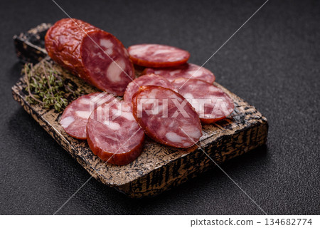 Smoked salami, thin beef or pork sausage, meat snacks. Salami sausage Smoked salami, thin beef or pork sausage, meat snacks. Salami sausage 134682774