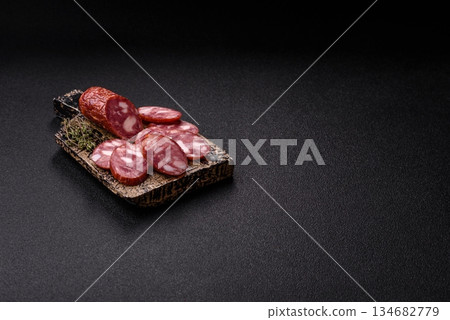 Smoked salami, thin beef or pork sausage, meat snacks. Salami sausage 134682779