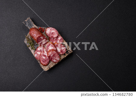 Smoked salami, thin beef or pork sausage, meat snacks. Salami sausage Smoked salami, thin beef or pork sausage, meat snacks. Salami sausage 134682780