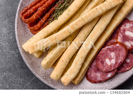 Grissini breadsticks, an Italian wheat pastry, are a great lunch snack. Grissini breadsticks 134682804