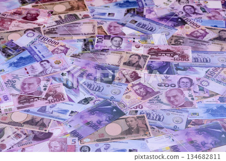 Money background, currency exchange, paper banknotes from different countries. Money cash currency Money background, currency exchange, paper banknotes from different countries. Money cash currency 134682811