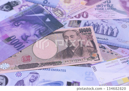 Money background, currency exchange, paper banknotes from different countries. Money cash currency Money background, currency exchange, paper banknotes from different countries. Money cash currency 134682820