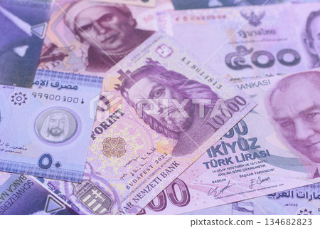 Money background, currency exchange, paper banknotes from different countries. Money cash currency Money background, currency exchange, paper banknotes from different countries. Money cash currency 134682823