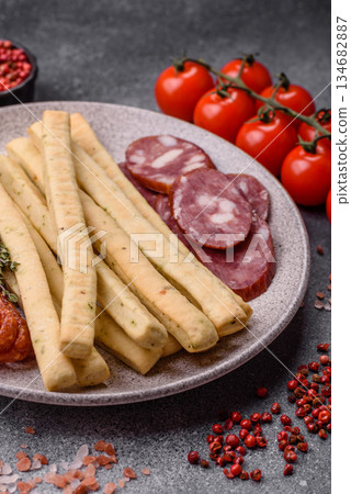 Grissini breadsticks, an Italian wheat pastry, are a great lunch snack. Grissini breadsticks Grissini breadsticks, an Italian wheat pastry, are a great lunch snack. Grissini breadsticks 134682887