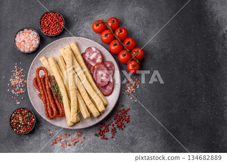 Grissini breadsticks, an Italian wheat pastry, are a great lunch snack. Grissini breadsticks 134682889