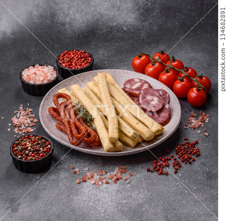 Grissini breadsticks, an Italian wheat pastry, are a great lunch snack. Grissini breadsticks 134682891