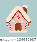 A cute vector illustration of a festive gingerbread house with pink frosting, candy canes, and snow.  134682937
