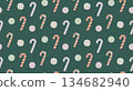 A cute seamless vector Christmas pattern featuring pastel candy canes and swirled sweets on a dark green background.  134682940