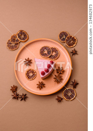 Raspberry or strawberry cheesecake, a slice of sweet red cake with berries. Raspberry cheesecake 134682973