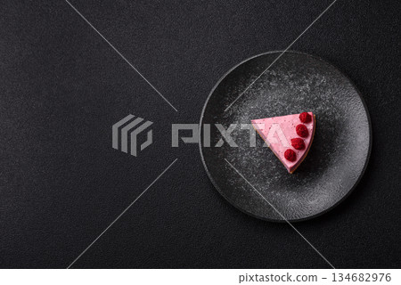 Raspberry or strawberry cheesecake, a slice of sweet red cake with berries. Raspberry cheesecake 134682976