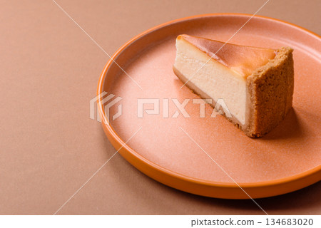New York cheesecake, a slice of sweet pie, a classic cheesecake dessert. New York cheesecake 134683020