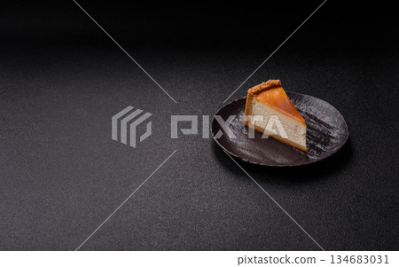 New York cheesecake, a slice of sweet pie, a classic cheesecake dessert. New York cheesecake 134683031